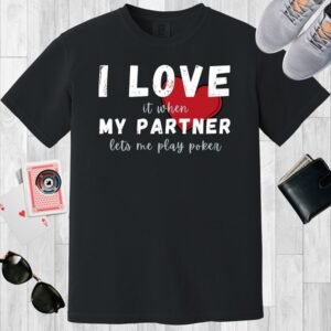 Black colored unisex crewneck poker-themed T-shirt. Design features the text 'I love it when my partner lets me play poker.' Image of a heart under the text.