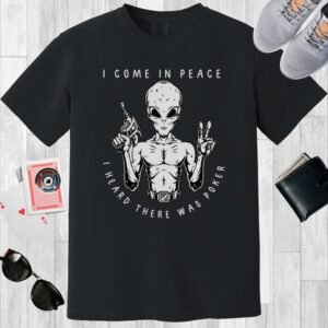 Black colored unisex crewneck poker-themed T-shirt. Design features the text 'I come in peace, I heard there was poker'. An alien with a gun and making the peace sign.