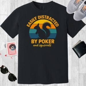 Black colored unisex crewneck poker-themed T-shirt. Design features the text 'Easily distracted by poker and squirrels'. A squirrel on a retro sunset background.