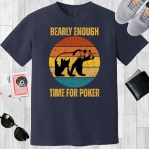 Navy colored unisex crewneck poker-themed T-shirt. Design features the text 'Bearly enough time for poker'. Image of a grizzly bear on a retro sunset background.