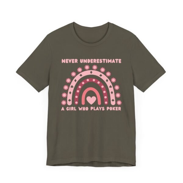 An army colored Bella+Canvas 3001 T-shirt featuring a boho rainbow graphic in shades of pink. The graphic incorporates elements of the game of poker, such as card suits and poker chips. The text in the design says "Never underestimate a girl who plays poker".