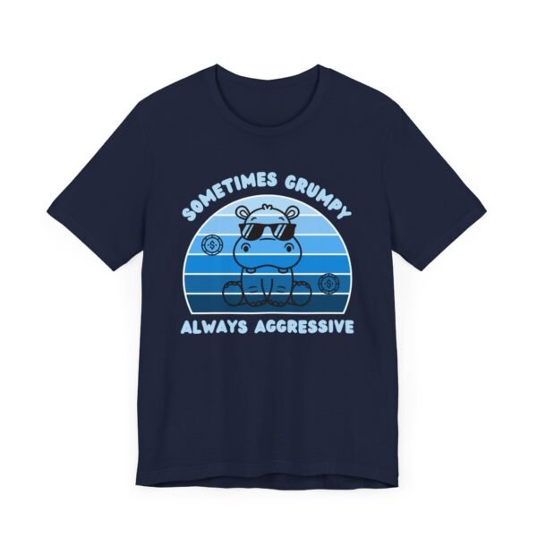 A navy Bella+Canvas 3001 T-shirt. The shirt has a shades of blue vintage sunset curved background with a cute hippopotamus wearing sunglasses. The text says "Sometimes grumpy always aggressive". It's a poker themed design as poker players are categorized as either passive or aggressive players.