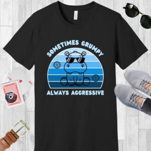 A black Bella+Canvas 3001 T-shirt. The shirt has a shades of blue vintage sunset curved background with a cute hippopotamus wearing sunglasses. The text says "Sometimes grumpy always aggressive". It's a poker themed design as poker players are categorized as either passive or aggressive players.