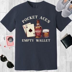 A poker-themed Comfort Colors crew neck T-shirt in color midnight. The design features a pair of aces, a bottle of whiskey and whiskey glass, along with the text 'Pocket aces, empty wallet'.