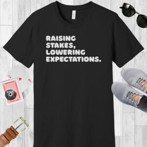 Black colored Bella+Canvas crewneck T-shirt with the poker-themed text 'Raising stakes lowering expectations'.