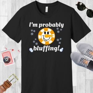 Black colored Bella+Canvas crewneck T-shirt. A poker-themed design combining a poker chip with a snowman face (including carrot nose) and the text 'I'm probably bluffing!'.