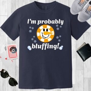 Navy colored Comfort Colors crewneck poker themed T-shirt. Image of poker chip with center featuring snowman face with long carrot nose. Text says "I'm probably bluffing!".
