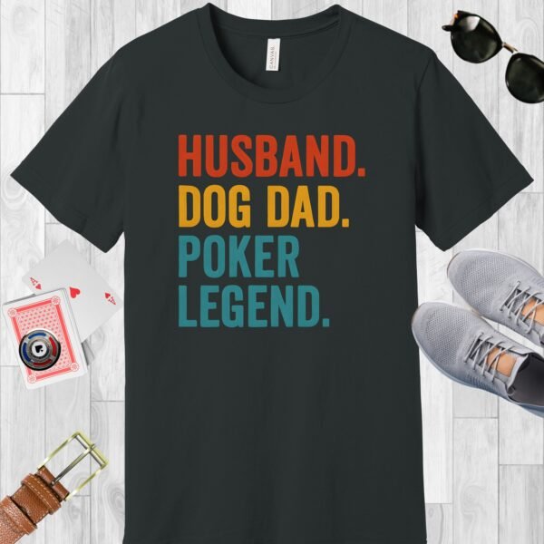 Dark Grey colored Bella+Canvas crewneck poker-themed T-shirt. Design features the multi-colored text 'Husband. Dog Dad. Poker Legend.'