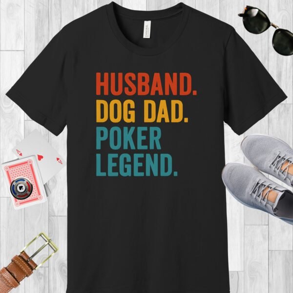 Black colored Bella+Canvas crewneck poker-themed T-shirt. Design features the multi-colored text 'Husband. Dog Dad. Poker Legend.'