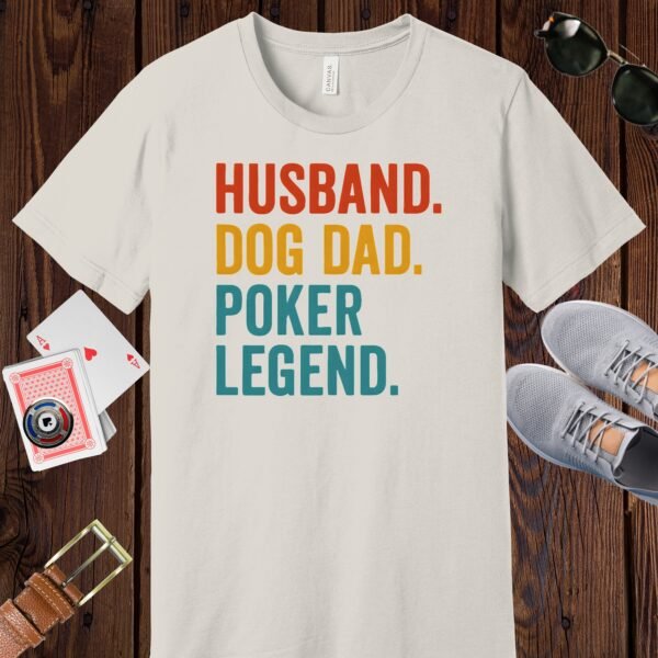 Vintage White colored Bella+Canvas crewneck poker-themed T-shirt. Design features the multi-colored text 'Husband. Dog Dad. Poker Legend.'