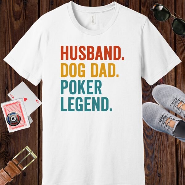 White colored Bella+Canvas crewneck poker-themed T-shirt. Design features the multi-colored text 'Husband. Dog Dad. Poker Legend.'