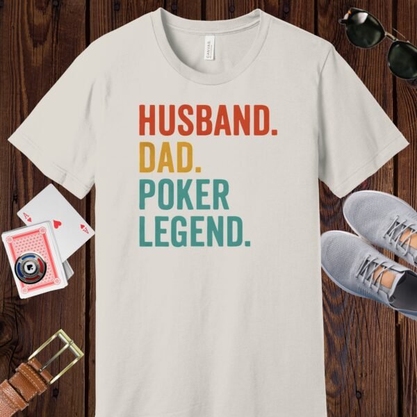 Vintage White colored Bella+Canvas crewneck poker-themed T-shirt. Design features the multi-colored text 'Husband. Dad. Poker Legend.'
