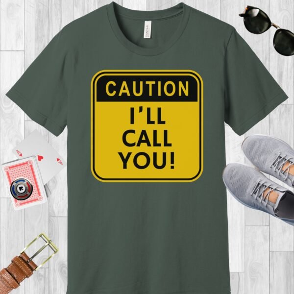 Military Green colored Bella+Canvas crewneck poker-themed T-shirt. Design features a caution sign with the text 'Caution I'll call you!'.
