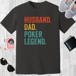 Graphite colored Comfort Colors crewneck poker-themed T-shirt. Design features the multi-colored text 'Husband. Dad. Poker Legend.'
