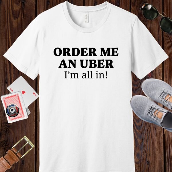 White colored Bella+Canvas crewneck poker-themed T-shirt. Design features the text 'Order me an Uber, I'm all in!'.