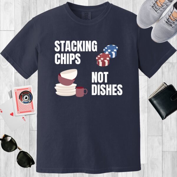 Navy colored Comfort Colors crewneck poker-themed T-shirt. Design features the text 'Stacking chips not dishes' along with images of poker chip stacks and piled dishes.