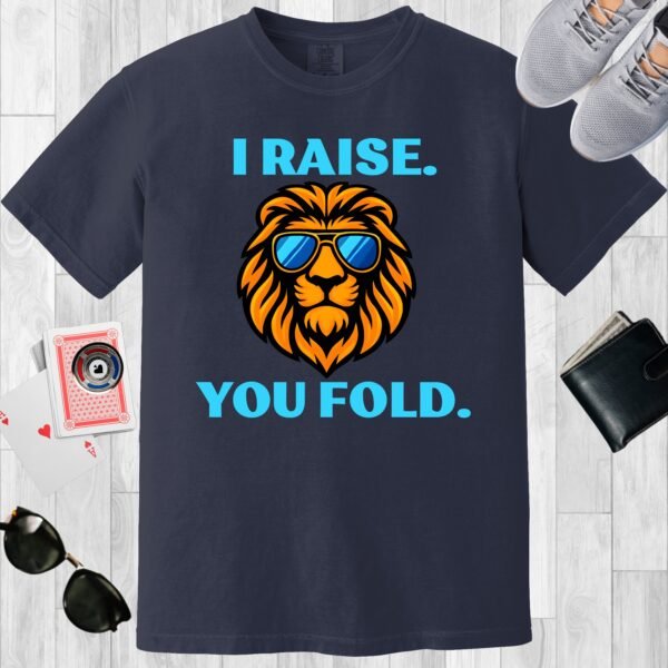 Navy colored Comfort Colors crewneck poker-themed T-shirt. Design features the text 'I raise. You fold.' along with an image of a lion wearing sunglasses.