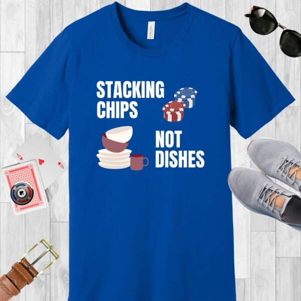 True Royal (blue) colored Bella+Canvas crewneck poker-themed T-shirt. Design features the text 'Stacking chips not dishes' along with images of poker chip stacks and piled dishes.
