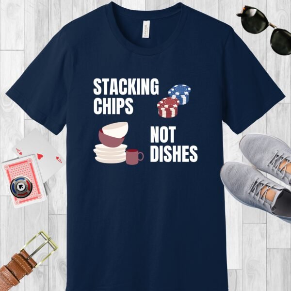 Navy colored Bella+Canvas crewneck poker-themed T-shirt. Design features the text 'Stacking chips not dishes' along with images of poker chip stacks and piled dishes.