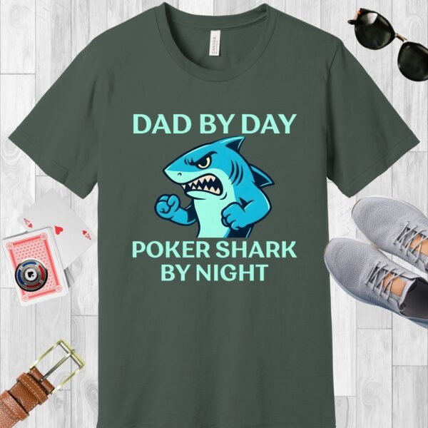 Military Green colored Bella+Canvas crewneck poker-themed T-shirt. Design features the text 'Dad by day Poker Shark by night' along with an image of an intimidating shark.
