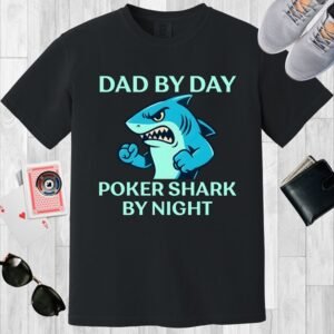 Black colored Comfort Colors crewneck poker-themed T-shirt. Design features the text 'Dad by day Poker Shark by night' along with an image of an intimidating shark.
