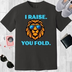 Graphite colored Comfort Colors crewneck poker-themed T-shirt. Design features the text 'I raise. You fold.' along with an image of a lion wearing sunglasses.