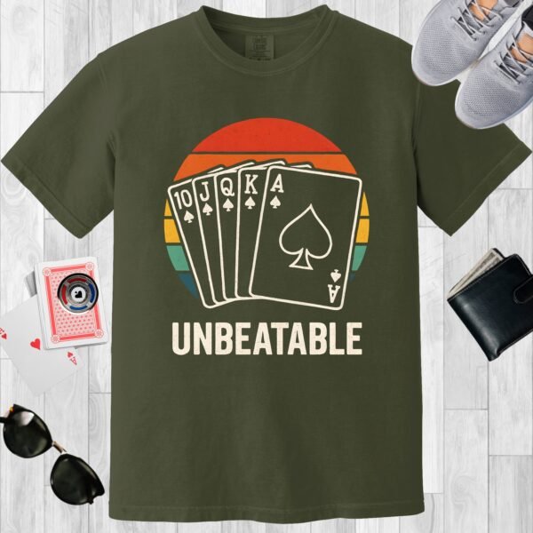 Moss colored unisex crewneck poker-themed T-shirt. Design features the text 'Unbeatable'. Image of a Royal Flush on a vintage sunset.