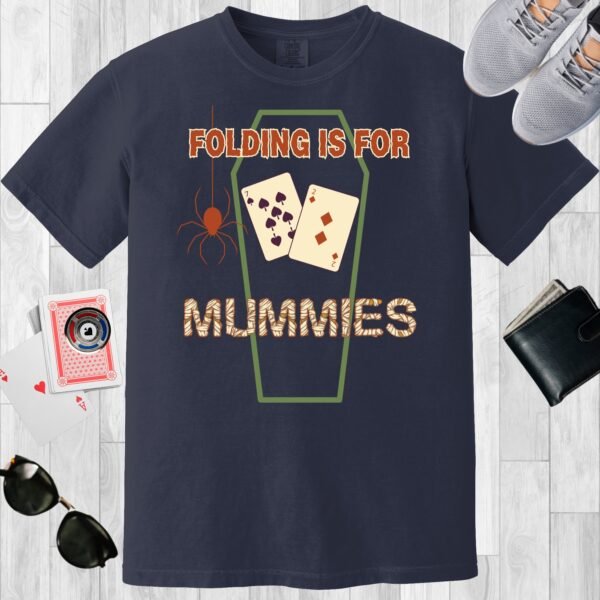 Navy colored unisex crewneck poker-themed T-shirt. Design features the text 'Folding is for mummies'. There's a spider, a coffin outline, and the playing cards 7 and 2.