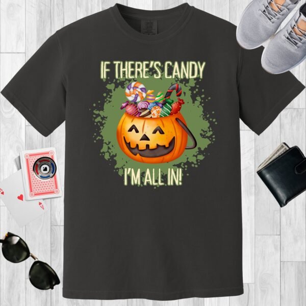 Graphite colored unisex crewneck poker-themed T-shirt. Design features the text 'If there's candy, I'm all in'. An image of a Jack-o-lantern filled with candy.