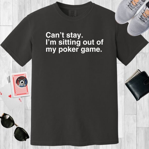 Graphite colored unisex crewneck poker-themed T-shirt. Design features the text 'Can't stay. I'm sitting out of my poker game.'