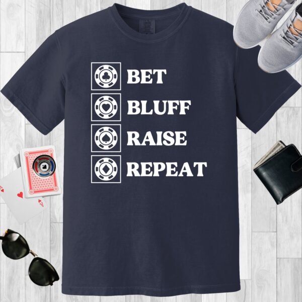 Navy colored unisex crewneck poker-themed T-shirt. Design features the text 'Bet Bluff Raise Repeat' with each line started with a poker chip image.