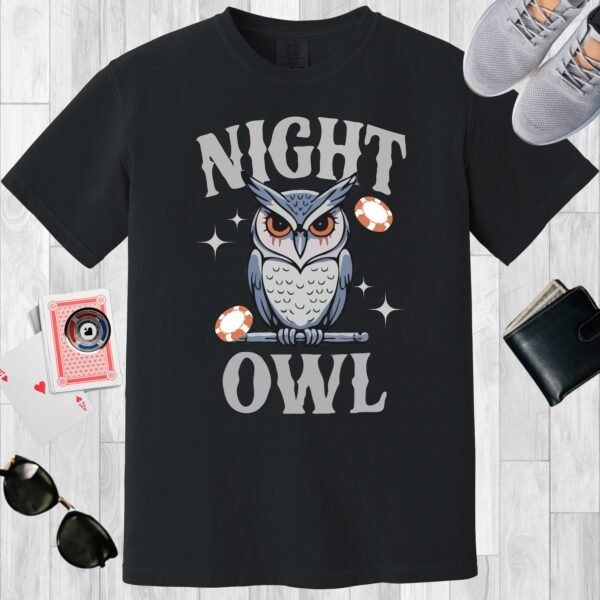Black colored unisex crewneck poker-themed T-shirt. Design features the text 'Night Owl'. An owl on a branch with poker chips and stars.