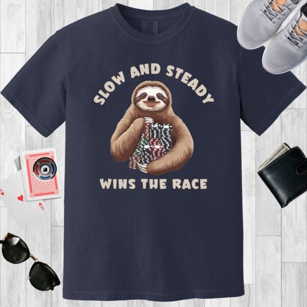 Navy colored unisex crewneck poker-themed T-shirt. Design features the text 'Slow and steady wins the race'. Image of a sloth with stacks of poker chips.