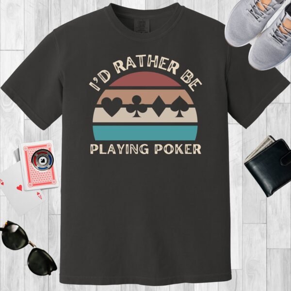 Graphite colored unisex crewneck poker-themed T-shirt. Design features the text 'I'd rather be playing poker'. Card suits on a retro sunset background.