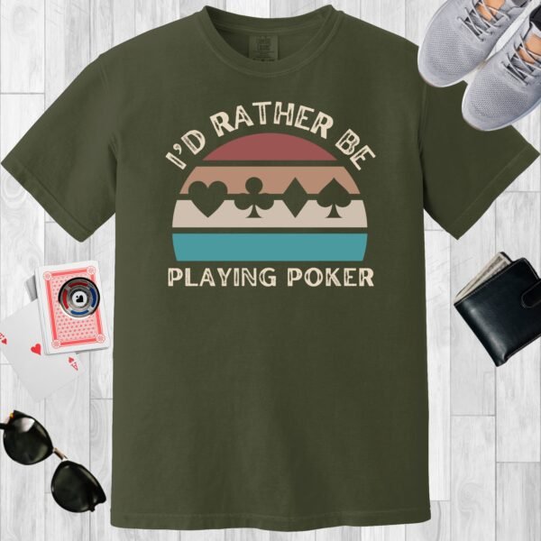 Moss colored unisex crewneck poker-themed T-shirt. Design features the text 'I'd rather be playing poker'. Card suits on a retro sunset background.