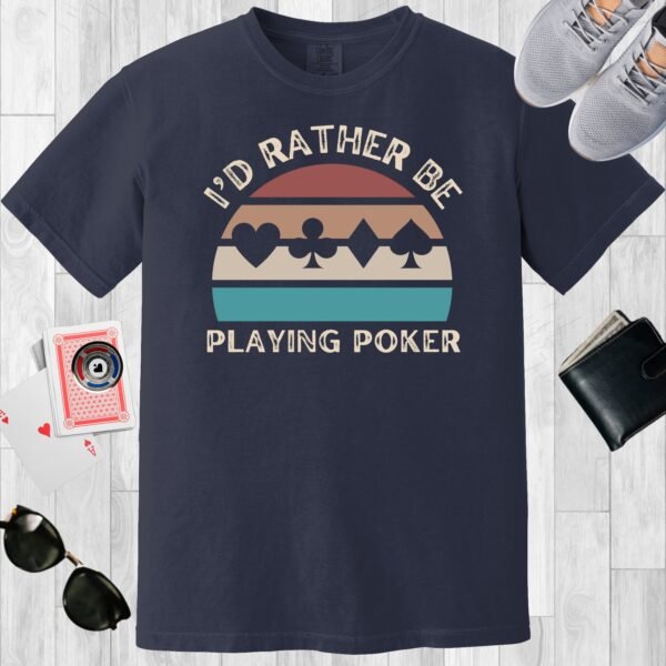 Navy colored unisex crewneck poker-themed T-shirt. Design features the text 'I'd rather be playing poker'. Card suits on a retro sunset background.
