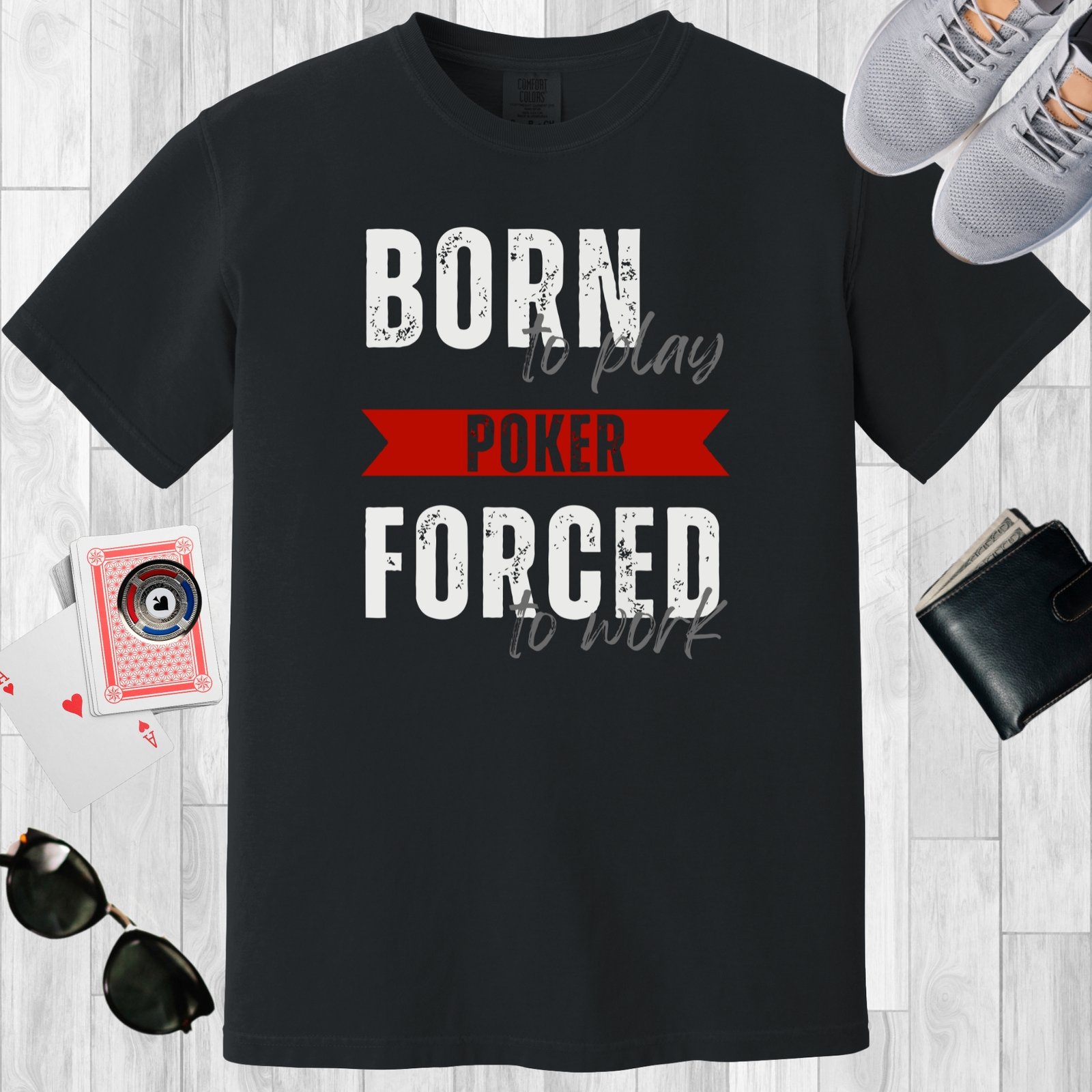 Black colored unisex crewneck poker-themed T-shirt. Design features the text 'Born to play poker, forced to work.'