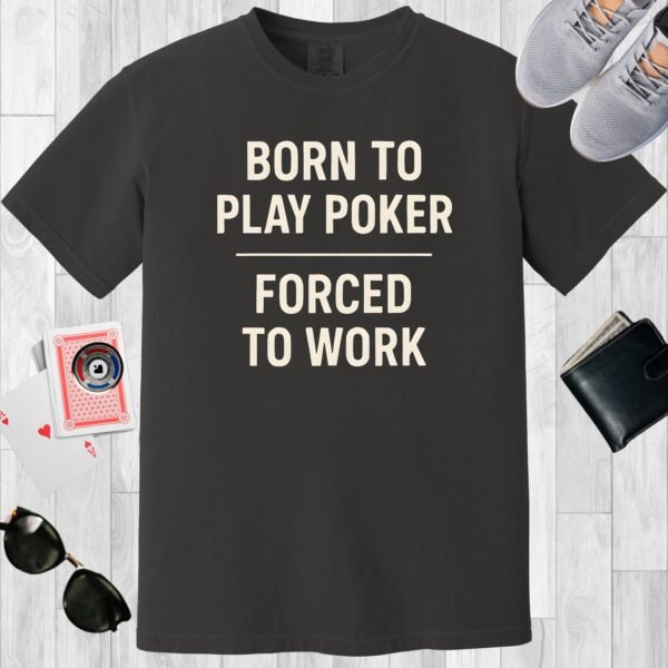 Graphite colored unisex crewneck poker-themed T-shirt. Design features the text 'Born to play poker, forced to work.'