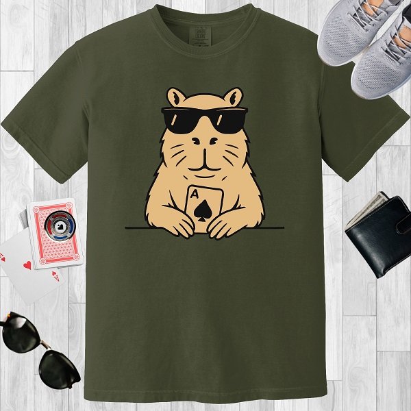 Moss colored unisex crewneck poker-themed T-shirt. Design features an image of a capybara with an Ace playing card.