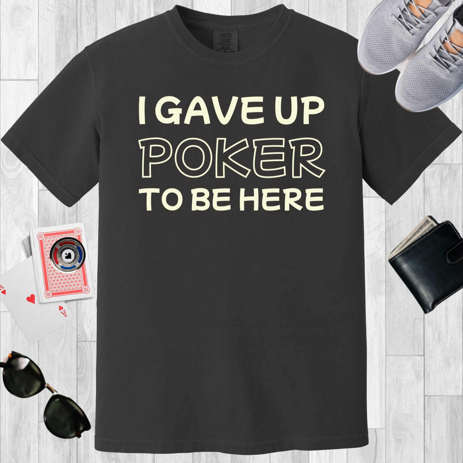 Graphite colored unisex crewneck poker-themed T-shirt. Design features the text 'I gave up poker to be here'.