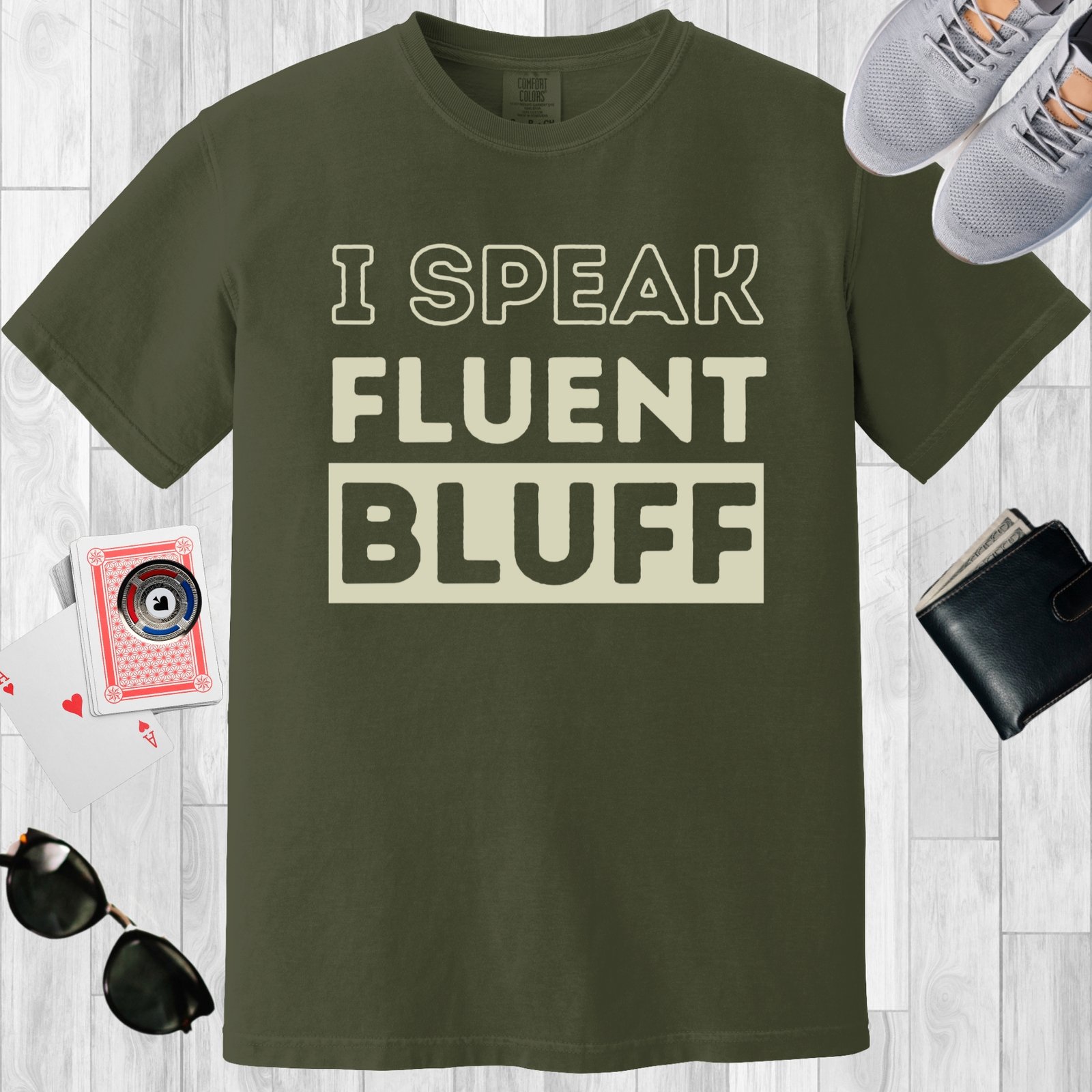 Moss colored unisex crewneck poker-themed T-shirt. Design features the text 'I speak fluent bluff'.