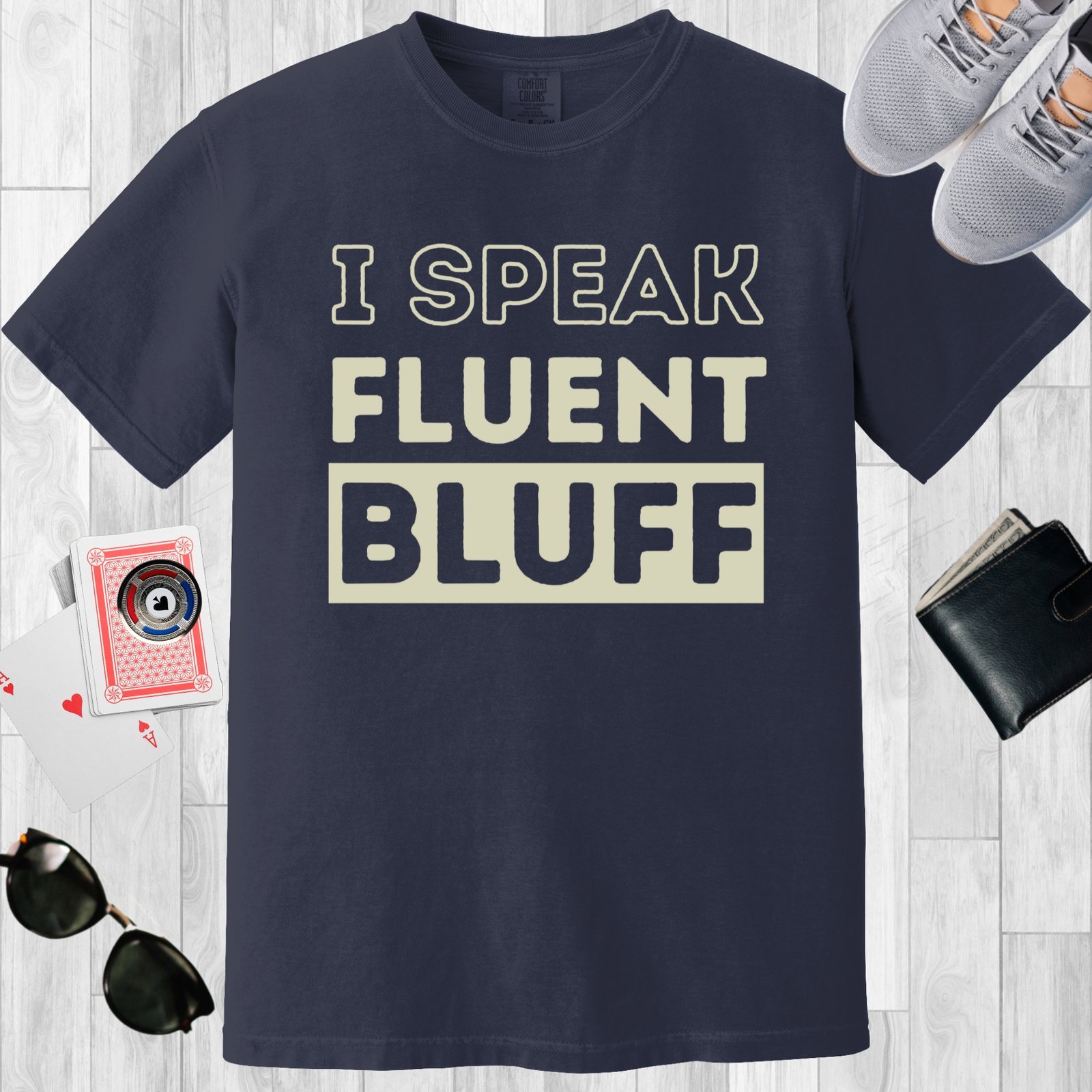 Navy colored unisex crewneck poker-themed T-shirt. Design features the text 'I speak fluent bluff'.