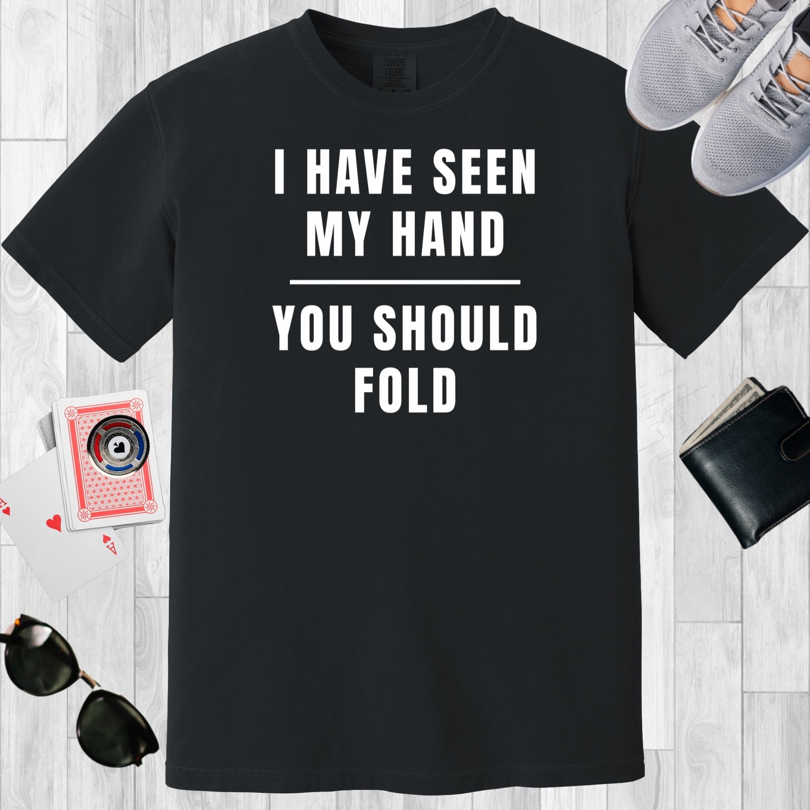 Black colored unisex crewneck poker-themed T-shirt. Design features the text 'I have seen my hand. You should fold'.