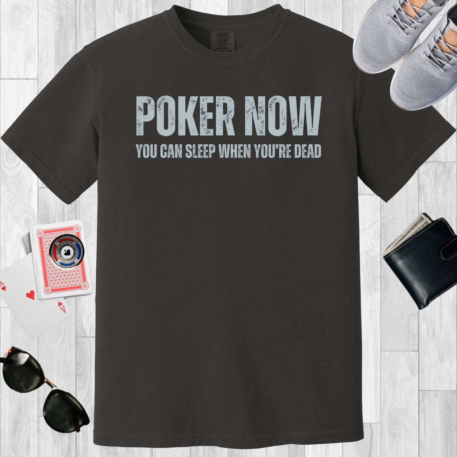 Graphite colored unisex crewneck poker-themed T-shirt. Design features the text 'Poker now, you can sleep when you're dead'.