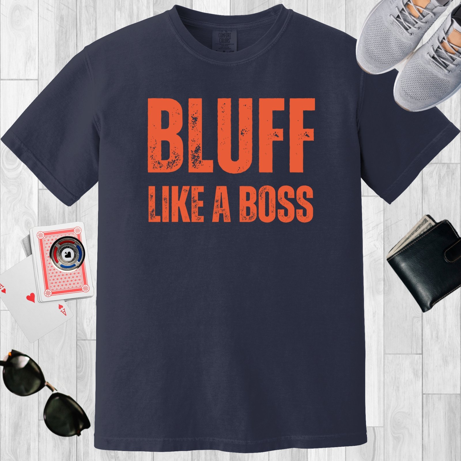 Navy colored unisex crewneck poker-themed T-shirt. Design features the text 'Bluff like a boss'.