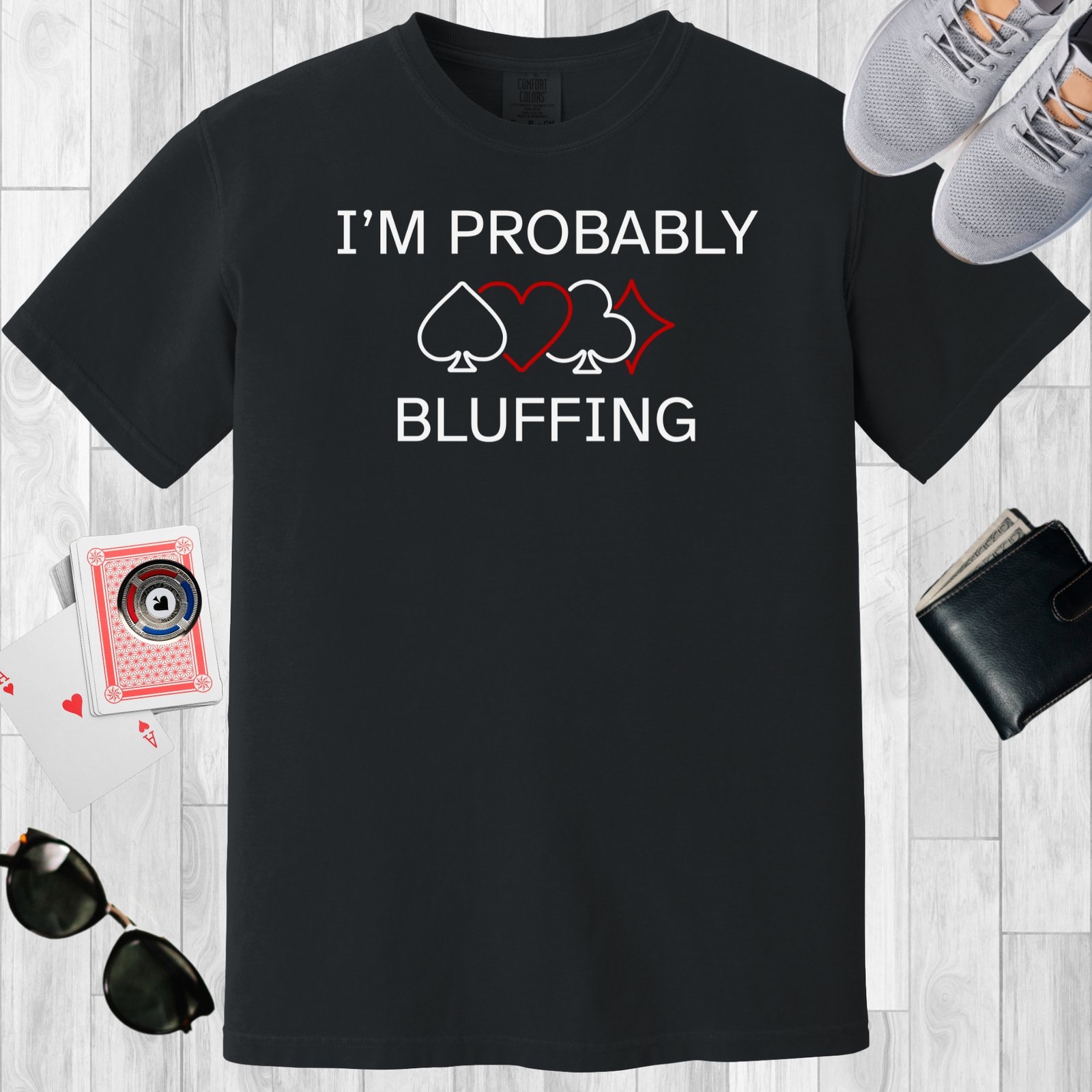 Black colored unisex crewneck poker-themed T-shirt. Design features line art of card suits and the text 'I'm probably bluffing'.