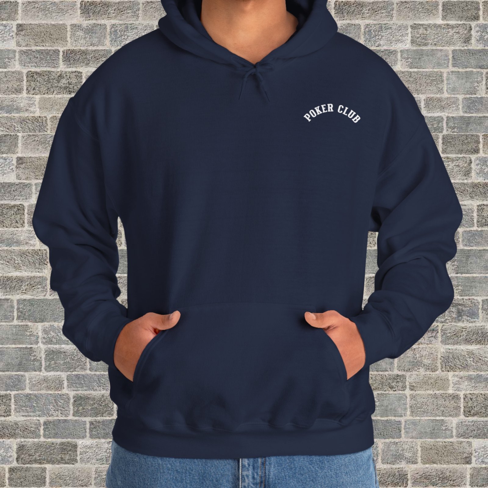 Person wearing a navy poker-themed Gildan hooded sweatshirt with the small left chest text "Poker Club" in front of a brick wall.