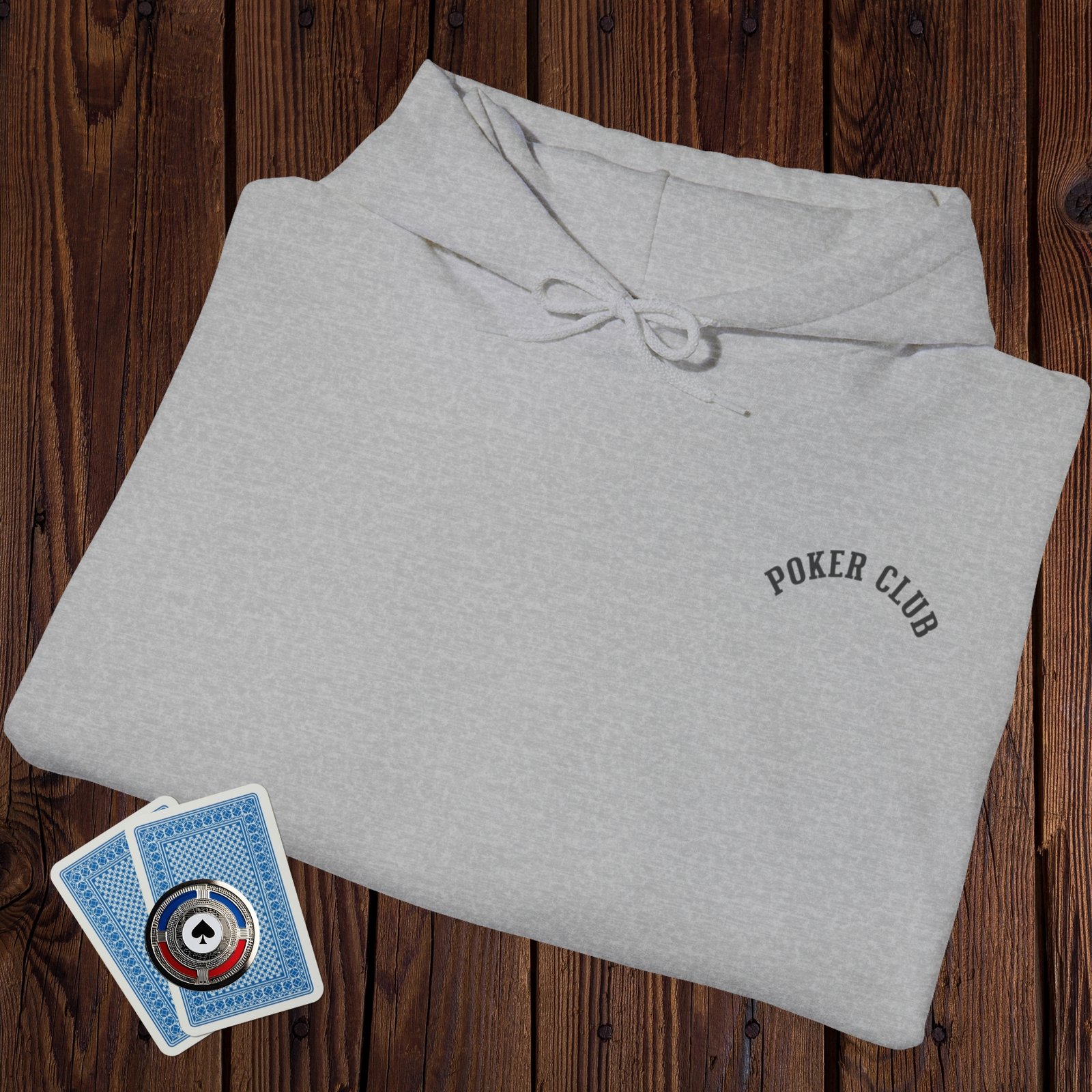 Folded Sport Grey poker-themed Gildan hooded sweatshirt with the small left chest text "Poker Club"