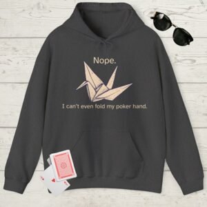 Dark heather poker-themed Gildan hooded sweatshirt with an image of an origami paper crane and the text "Nope. I can't even fold my poker hand."