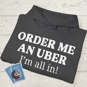 Folded Dark Heather poker-themed Gildan hooded sweatshirt with the text "Order me an Uber. I'm all in."